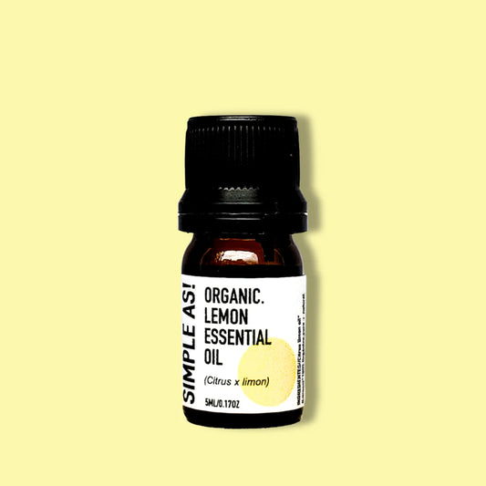 aceite esencial de limón con fondo plano.