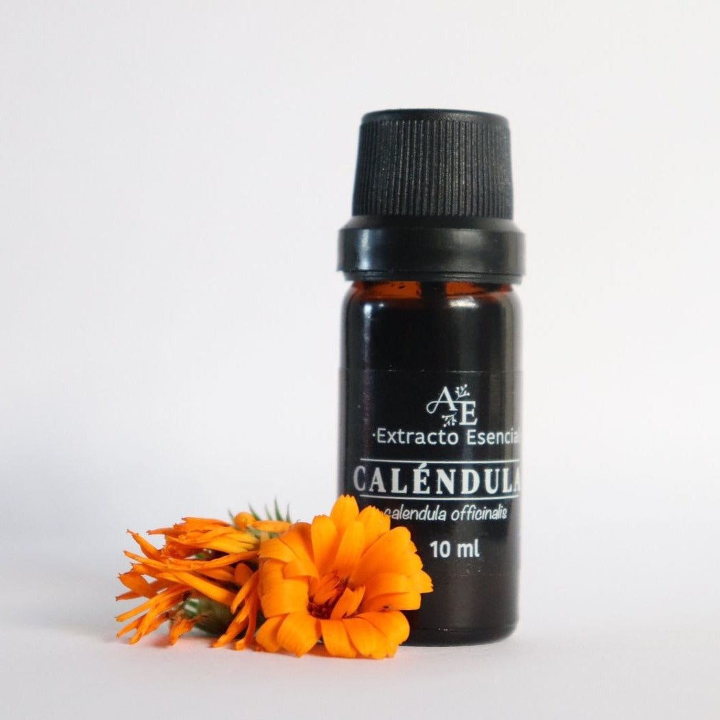 Extracto de caléndula Ananda a lado flores de calendula.