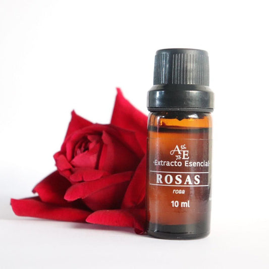 Extracto de rosas Ananda a lado alguna petalos de rorsas.