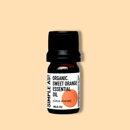 el aceite esencial de naranja de simple as con fondo plano