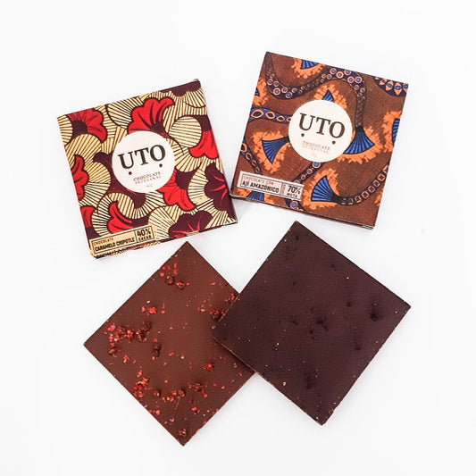 Chocolate Artesanal colombiano de oku ose abierto a lado su caja