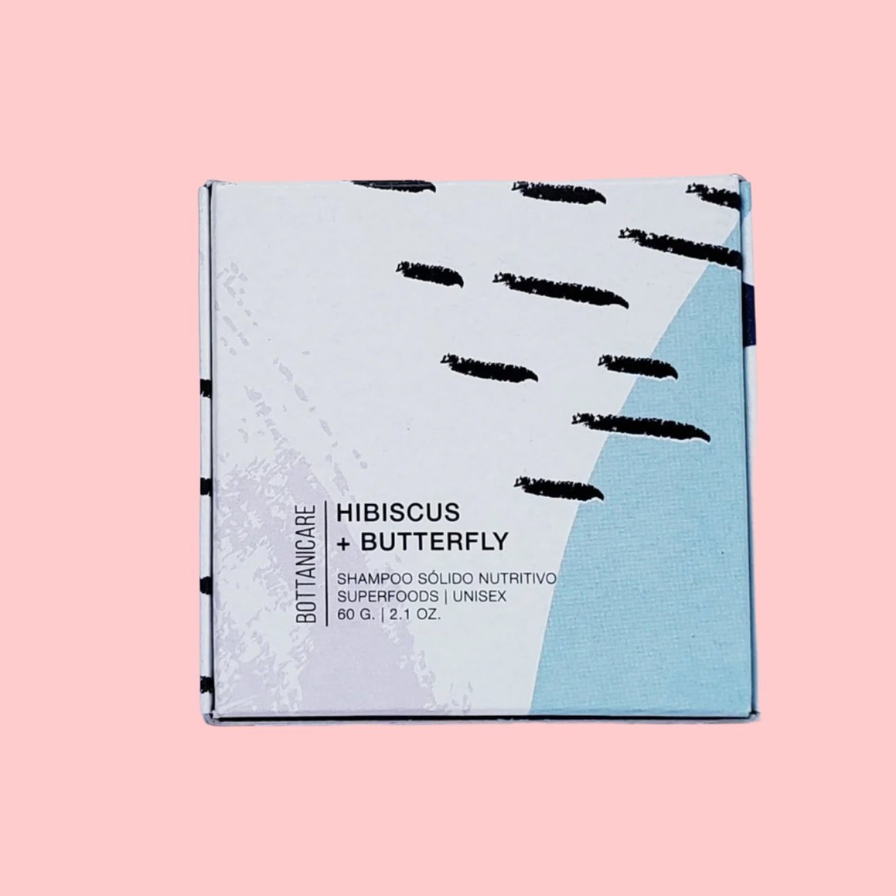 El shampoo solido hibiscus y butterfly 60g de bottanicare con su caja con fondo plano.